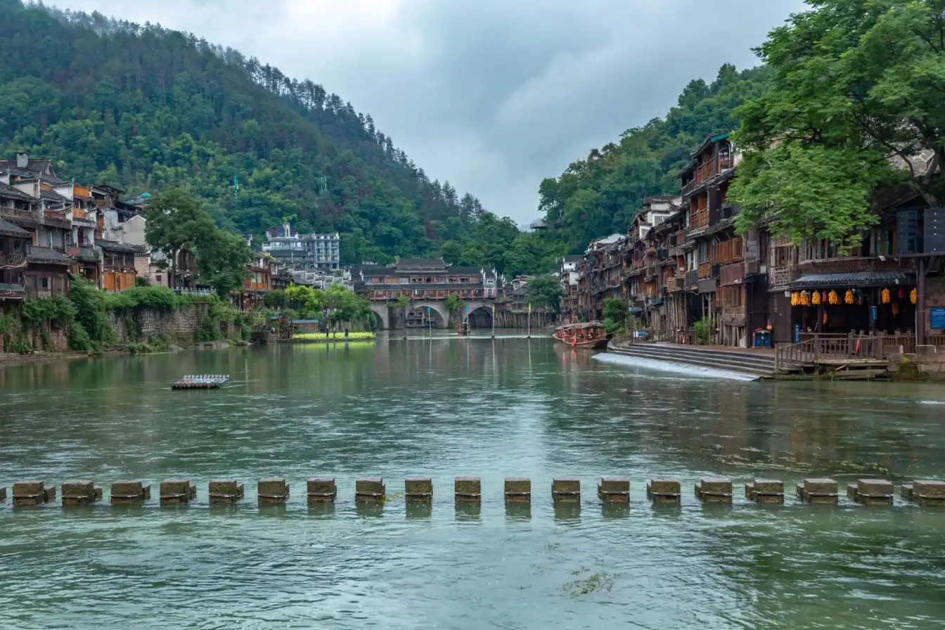 Ancient town charm, timeless beauty, traditional houses, rich history, cultural heritage, travel destination, photography spot, mountain views