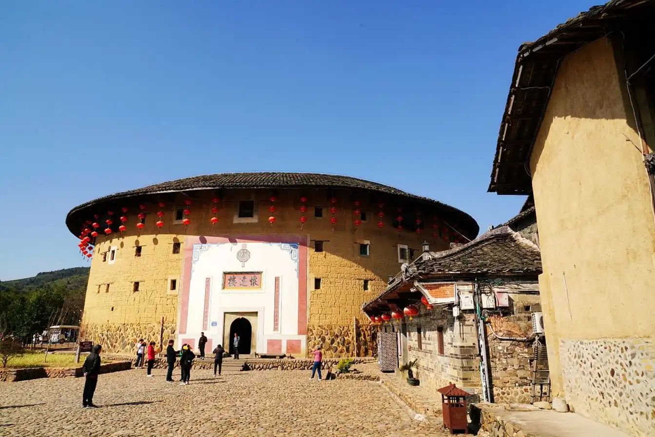 Ancient earthen buildings, Chinese architecture, cultural heritage, historic sites, traditional villages, scenic landscapes