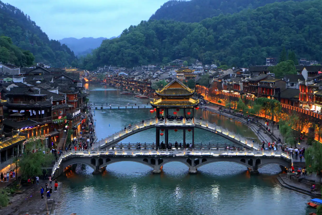 Ancient town charm, timeless beauty, traditional houses, rich history, cultural heritage, travel destination, photography spot, mountain views