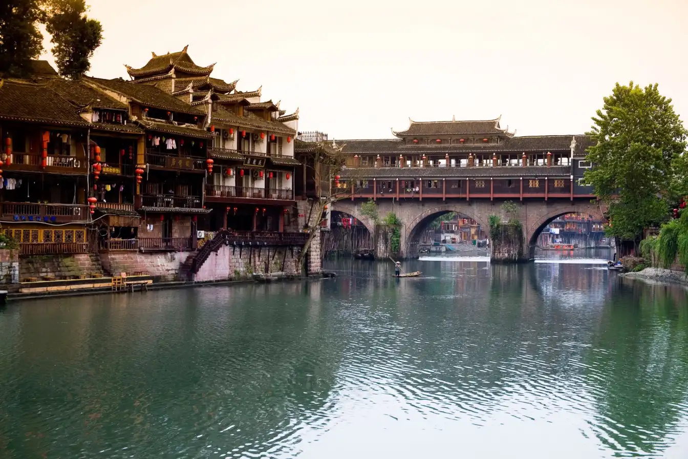 Ancient town charm, timeless beauty, traditional houses, rich history, cultural heritage, travel destination, photography spot, mountain views